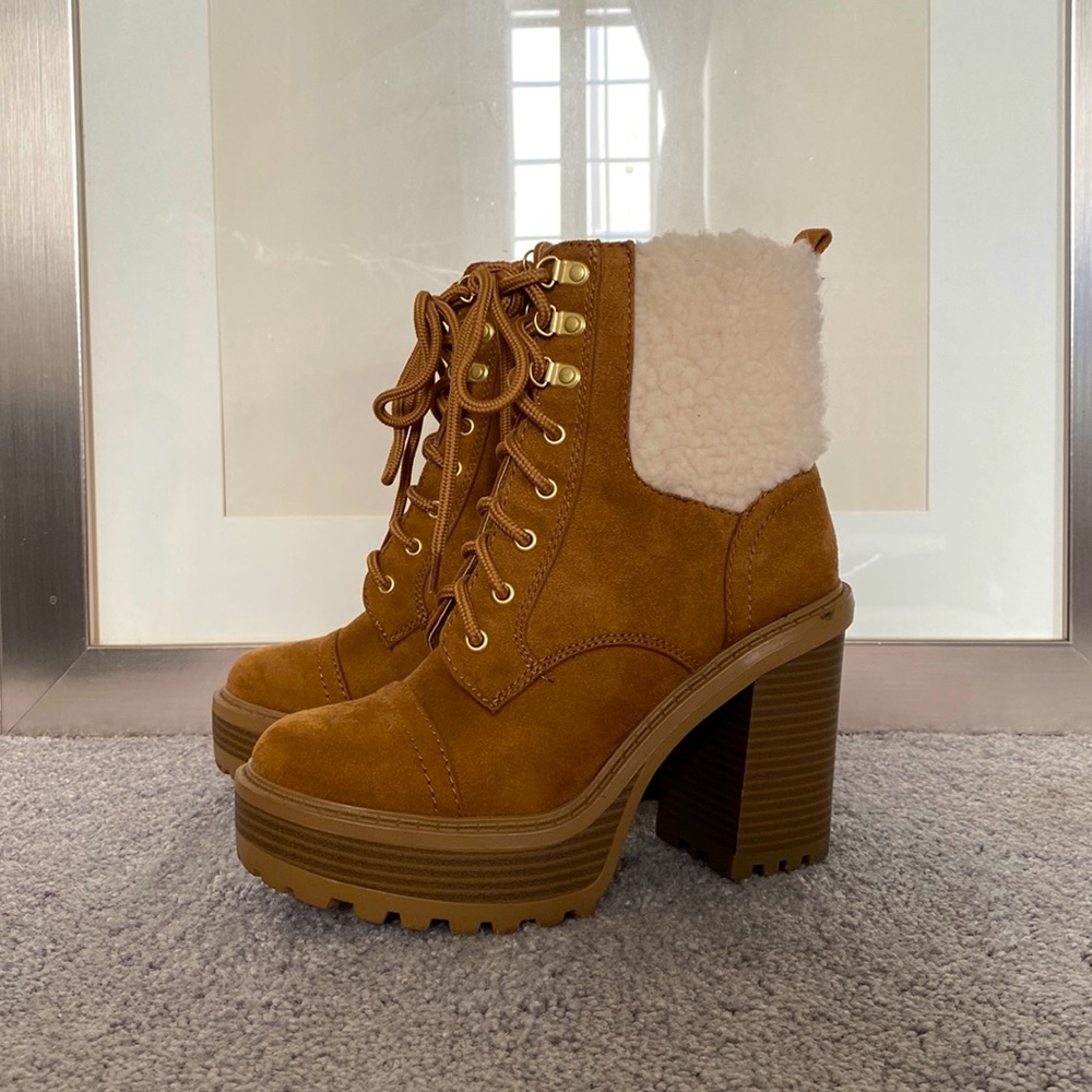 Soda platform lace up boots with faux shearling trim